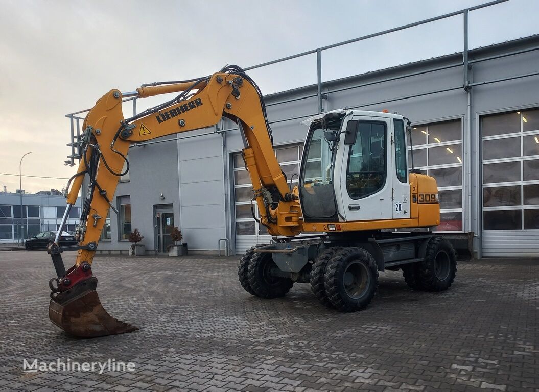 Liebherr A 309 Litronic wheel excavator